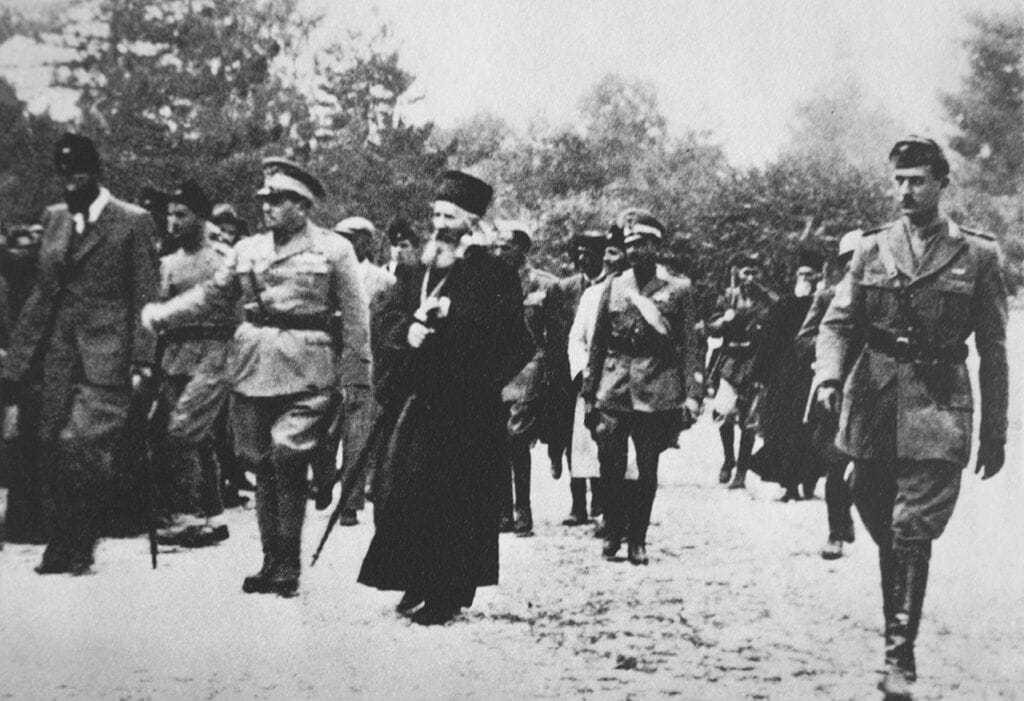 Бајо Станишић и митрополит Јоаникије са генералом Пирциом Биролијем на Цетињу